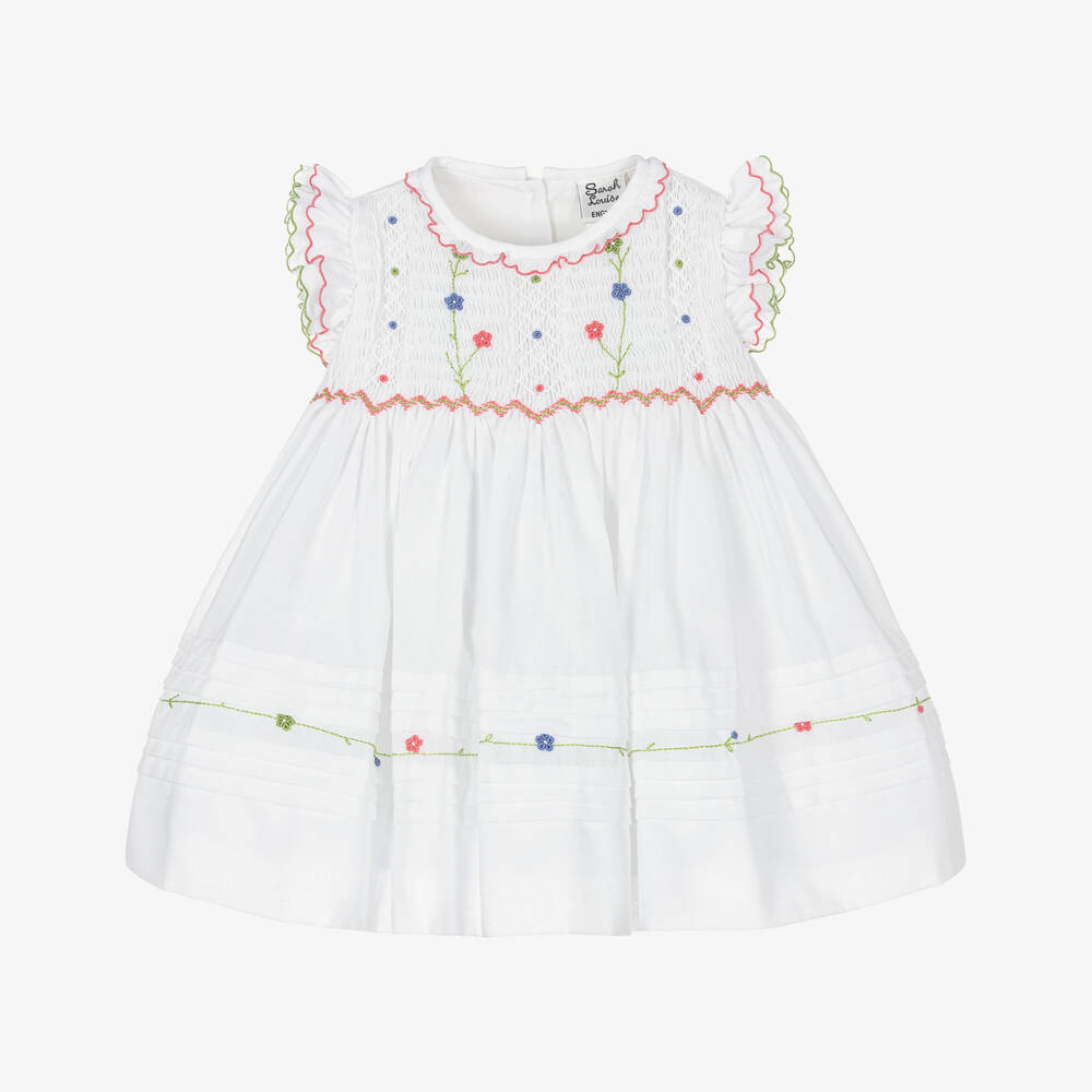 Sarah Louise-Girls White Hand-Smocked Dress with Floral Embroidery | Childrensalon